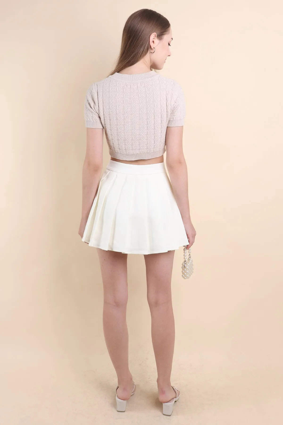 CAMU PLEATED SKIRT IN CREAM WHITE