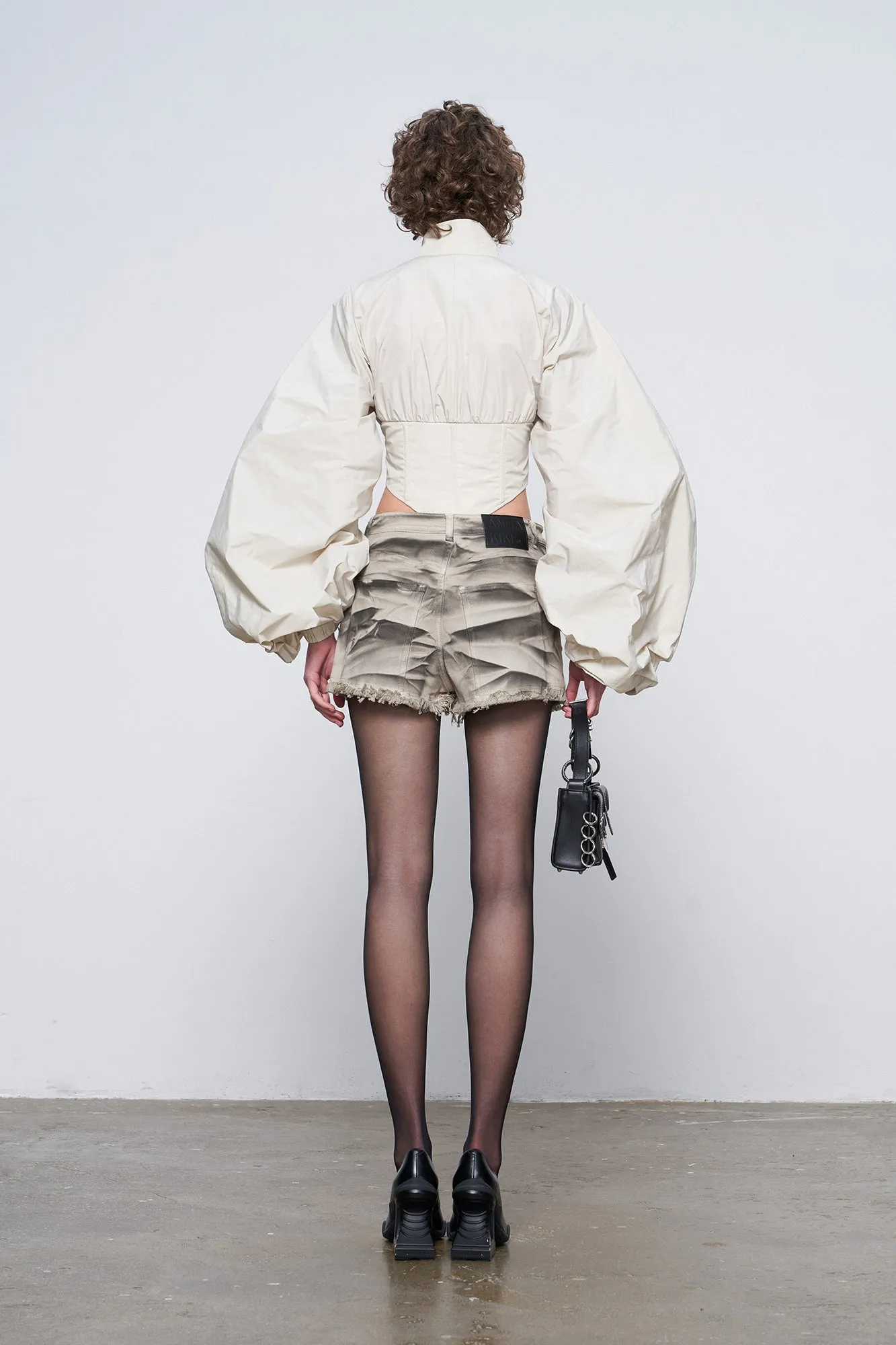 Futuristic fishbone pleated jacket